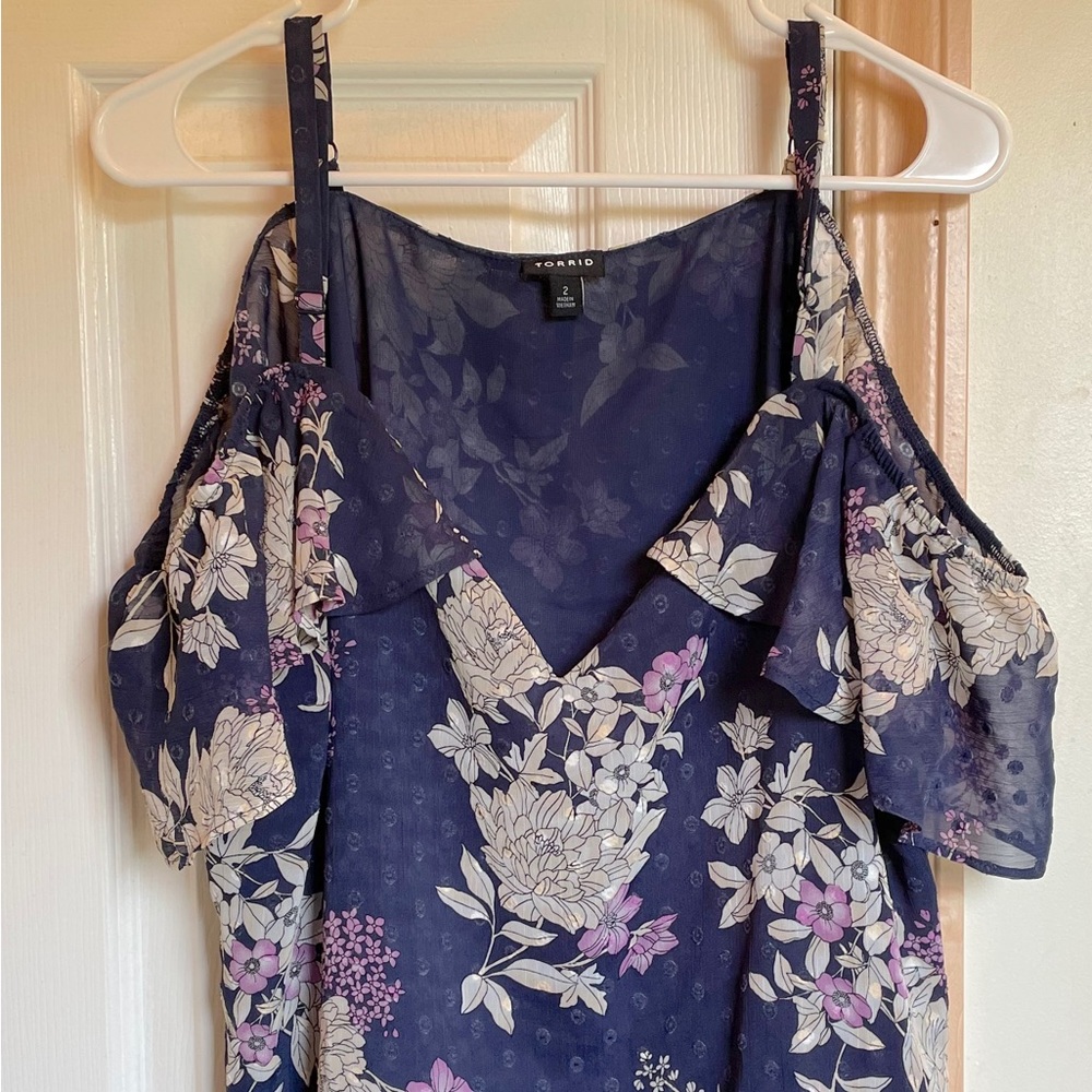 Pretty Torrid cold shoulder blouse, size 2.
